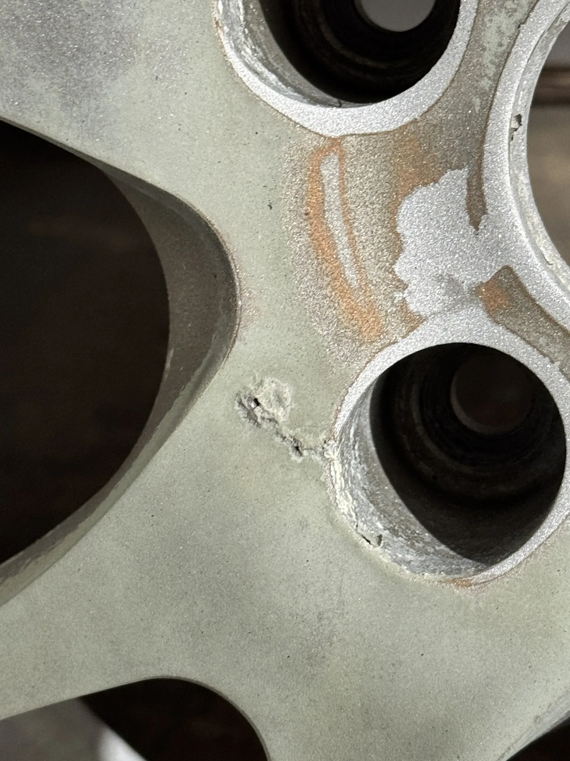 Corrosion on an alloy wheel as it arrived