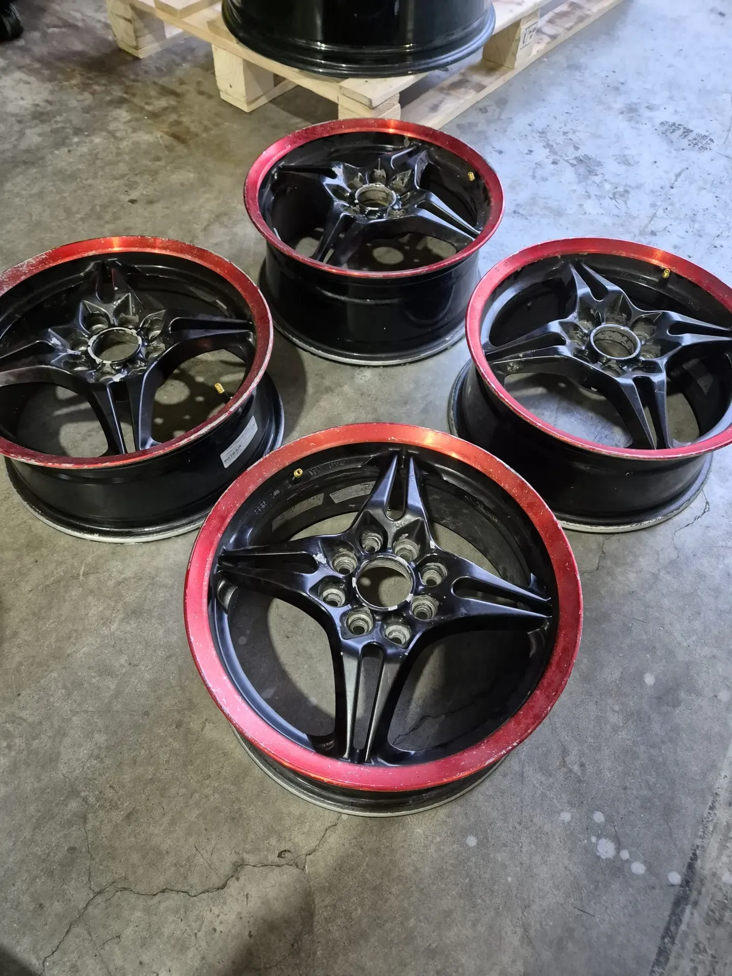 Black wheels with red pinstripe lips